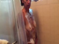 Reluctant wife gets soaped up in the shower